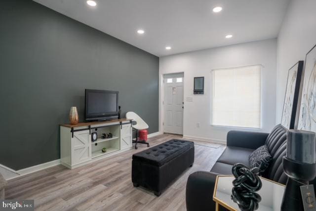2614 Grogan Ave, Baltimore, MD 21213 - living area featuring wood finished floors, recessed lighting, and baseboards