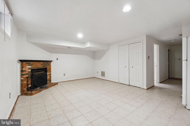 basement with a fireplace