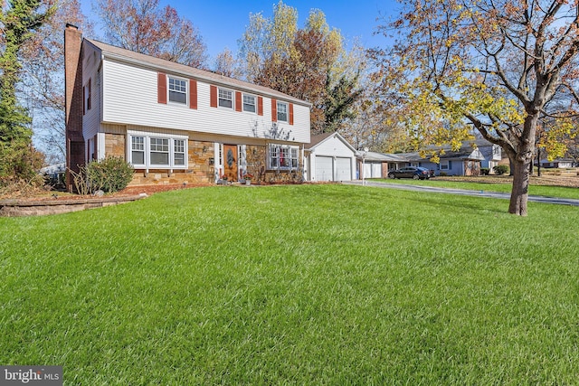 90 Torrington Ln, Willingboro, NJ 08046 - colonial-style house with stone siding, a chimney, a front lawn, and driveway