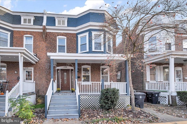 multi unit property featuring covered porch