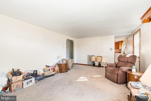 unfurnished living room with carpet flooring