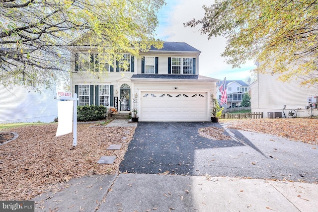 view of front of property featuring a garage