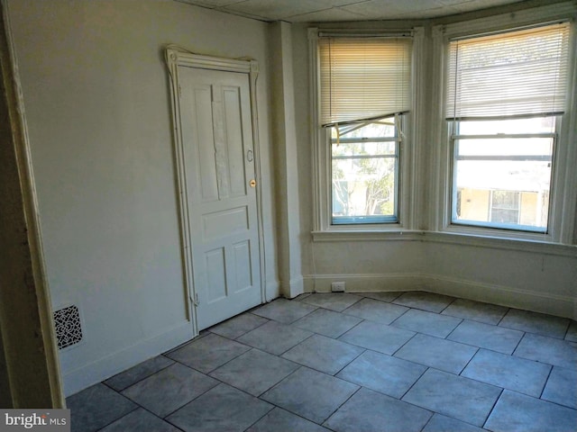 3032 N Swanson St, Philadelphia, PA 19134 - tiled spare room featuring plenty of natural light