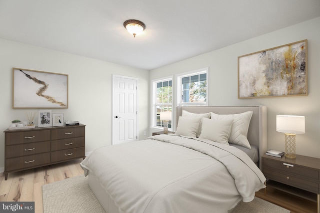 bedroom with light hardwood / wood-style flooring