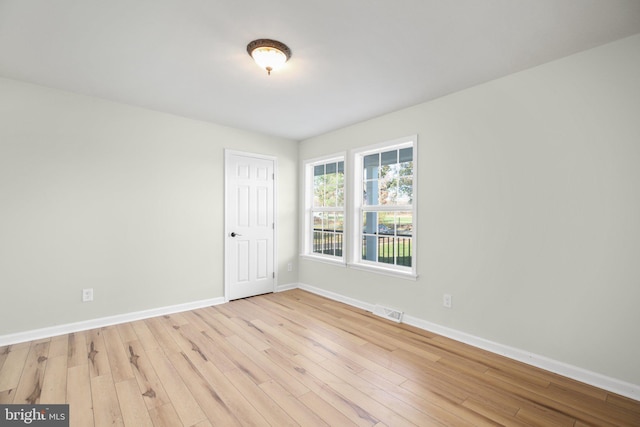 empty room featuring light hardwood / wood-style floors