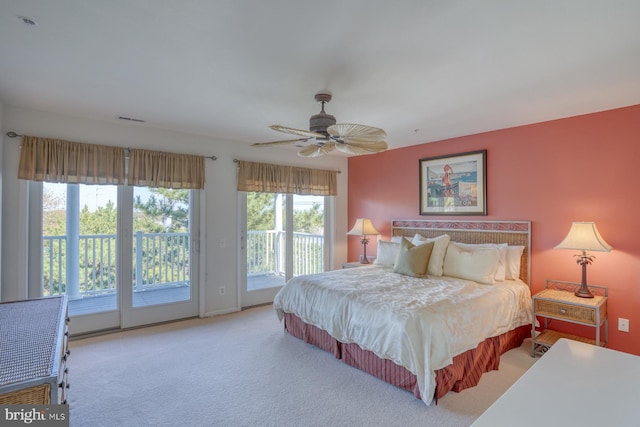 carpeted bedroom featuring access to outside and ceiling fan