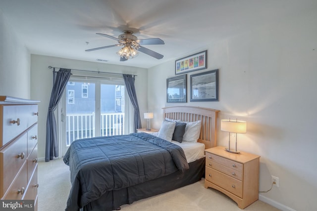 carpeted bedroom with access to outside and ceiling fan