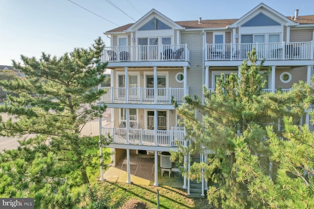 rear view of house with a balcony