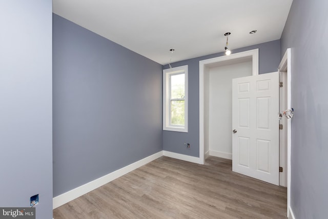 unfurnished bedroom with light hardwood / wood-style floors