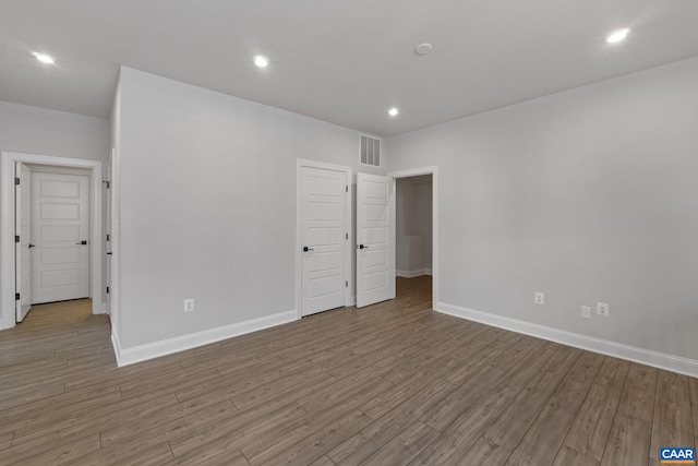 unfurnished bedroom with light hardwood / wood-style floors