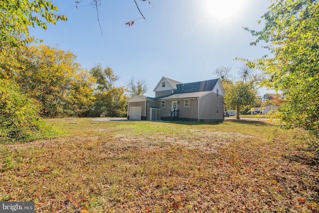 view of yard featuring a garage