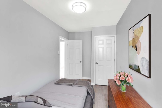 bedroom featuring dark hardwood / wood-style floors