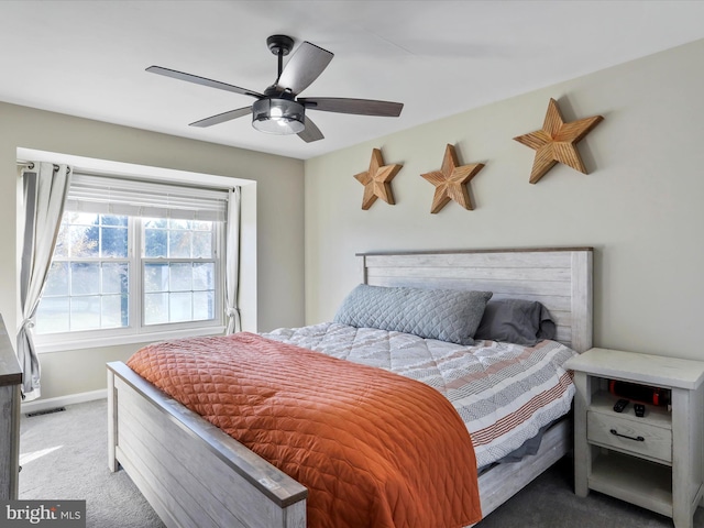 bedroom with light colored carpet and ceiling fan