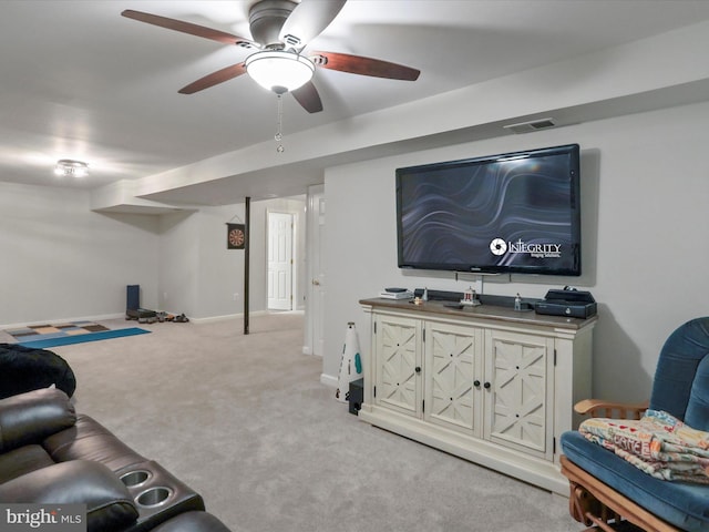 living room featuring ceiling fan and light carpet