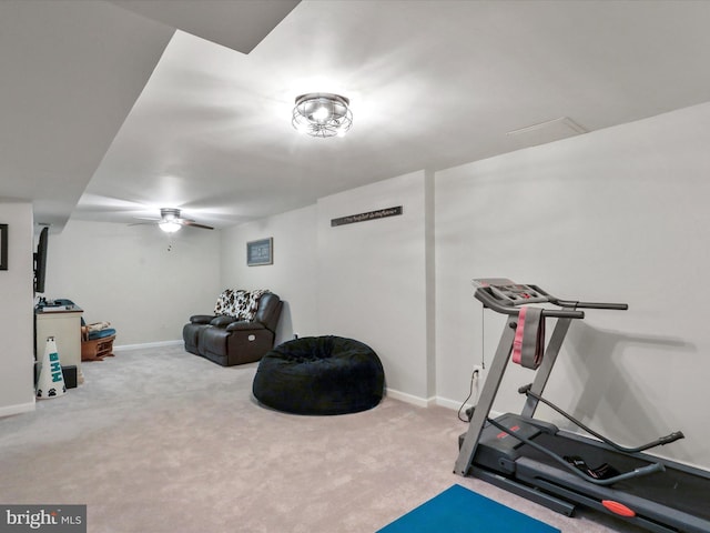 exercise room featuring carpet and ceiling fan