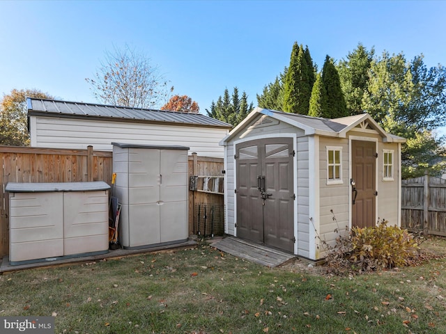 view of outdoor structure featuring a yard