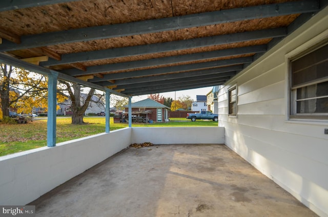 view of patio / terrace featuring a carport