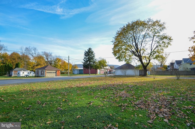 view of yard featuring a garage