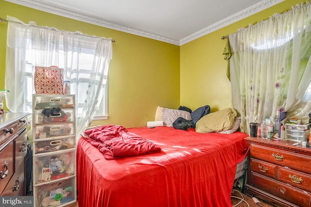 bedroom featuring ornamental molding