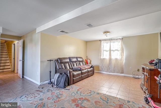 living room with light tile patterned floors