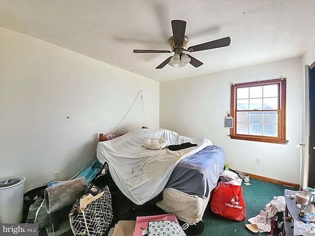 bedroom with ceiling fan and carpet