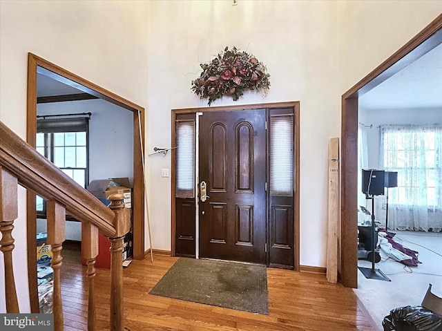 foyer entrance featuring hardwood / wood-style flooring