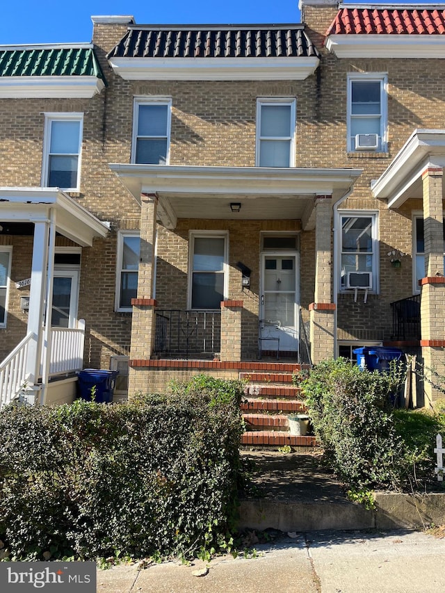 multi unit property with cooling unit and covered porch