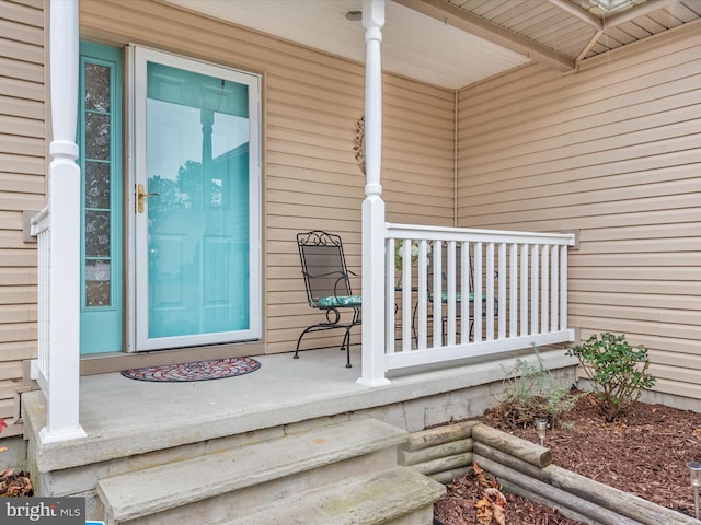 doorway to property featuring a porch