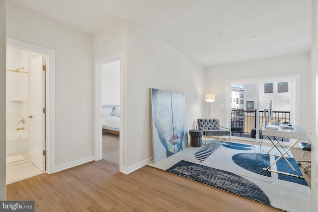 interior space with hardwood / wood-style flooring