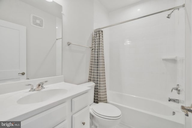 full bathroom with shower / bath combination with curtain, vanity, and toilet