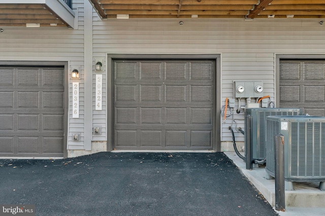 garage with central AC unit