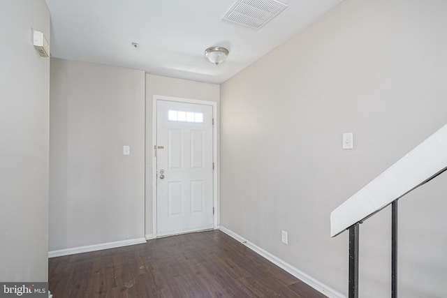 foyer featuring dark wood-type flooring