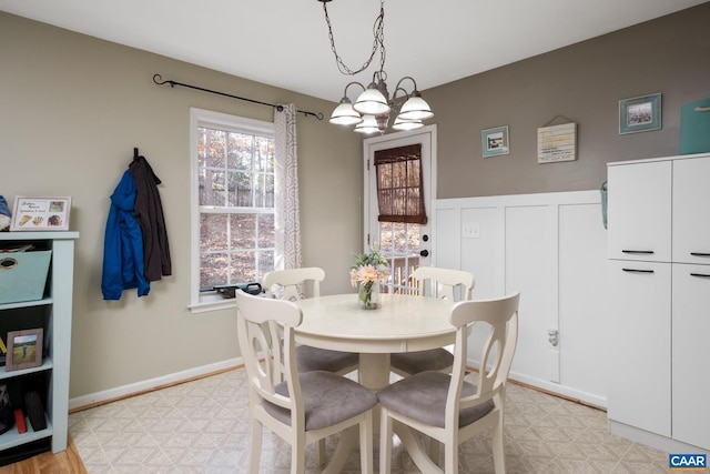 dining room with a chandelier