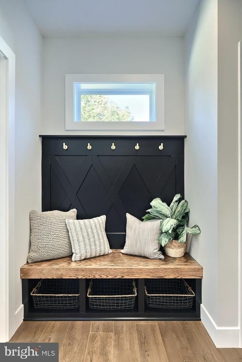 mudroom with light hardwood / wood-style flooring