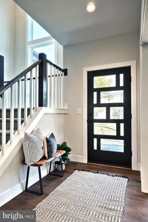 foyer featuring dark hardwood / wood-style floors