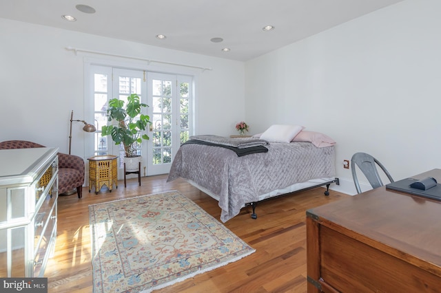 bedroom with light wood-type flooring