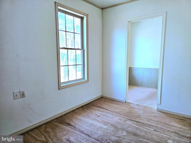 spare room featuring light hardwood / wood-style floors