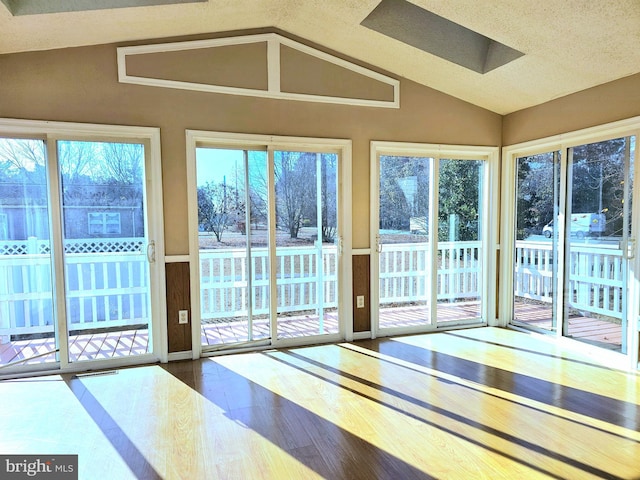 interior space featuring lofted ceiling