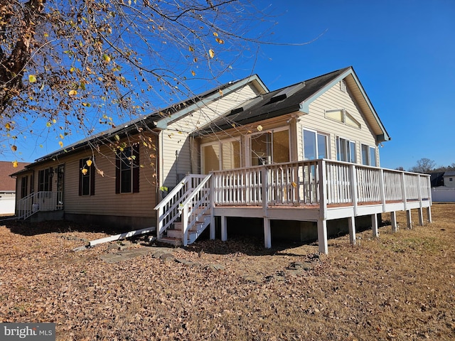 view of front of house featuring a wooden deck