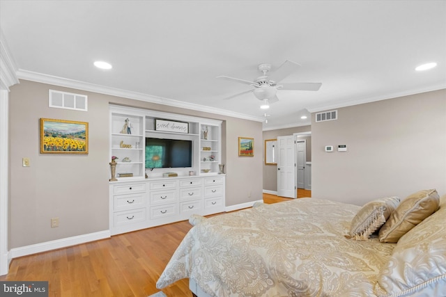 bedroom featuring ornamental molding, visible vents, and baseboards