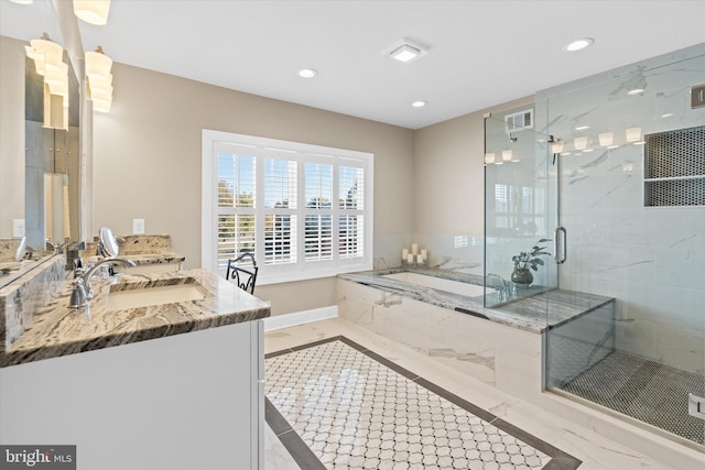 bathroom featuring a shower stall, recessed lighting, marble finish floor, and a garden tub