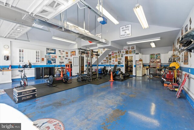 garage featuring a garage door opener