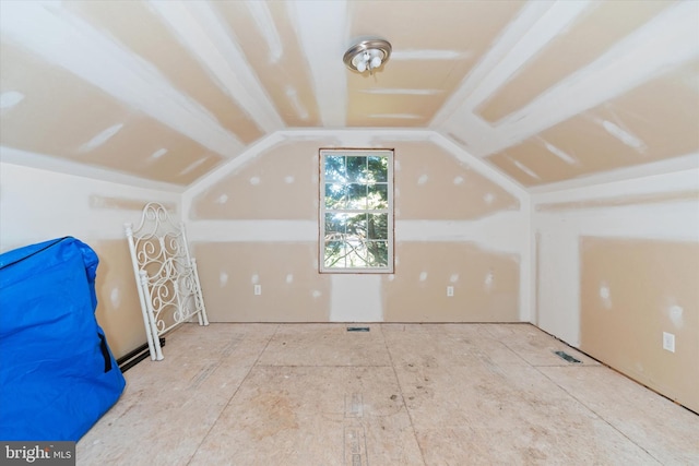 bonus room featuring lofted ceiling