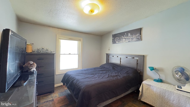 bedroom with a textured ceiling