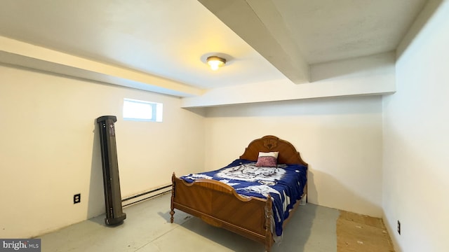 bedroom featuring beamed ceiling and a baseboard radiator