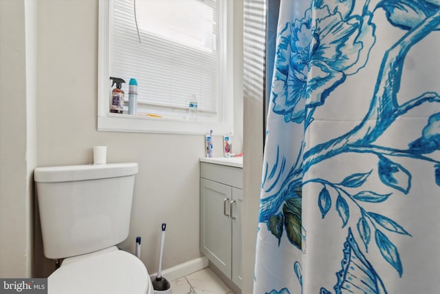 bathroom with vanity and toilet