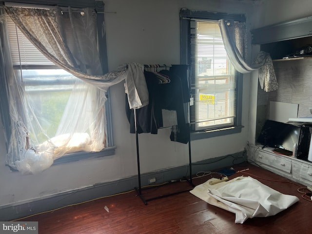 bedroom with hardwood / wood-style floors