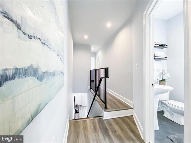 hallway with wood-type flooring