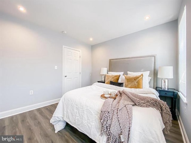 bedroom featuring dark hardwood / wood-style floors