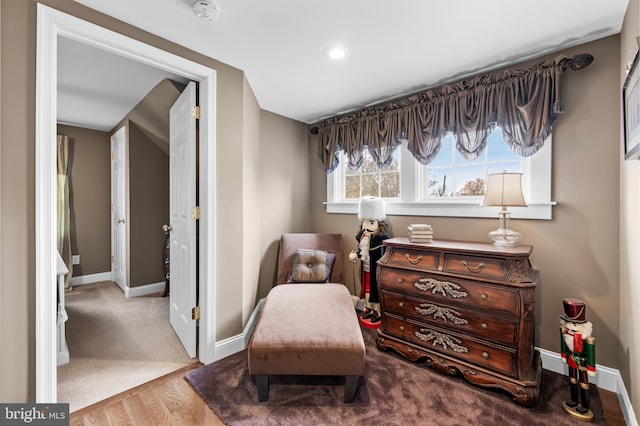 sitting room with light hardwood / wood-style flooring